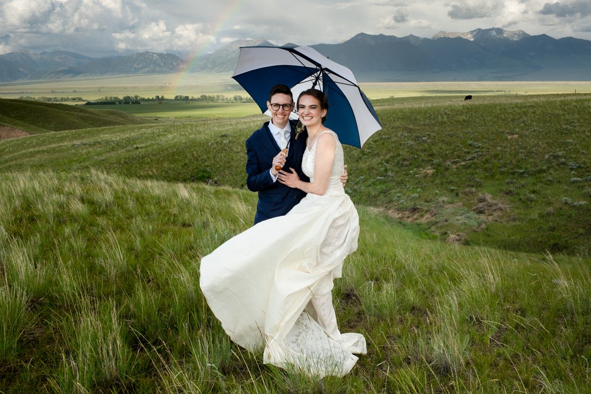 LGBTQ-newlyweds-portrait-under-a-Montana-rainbow