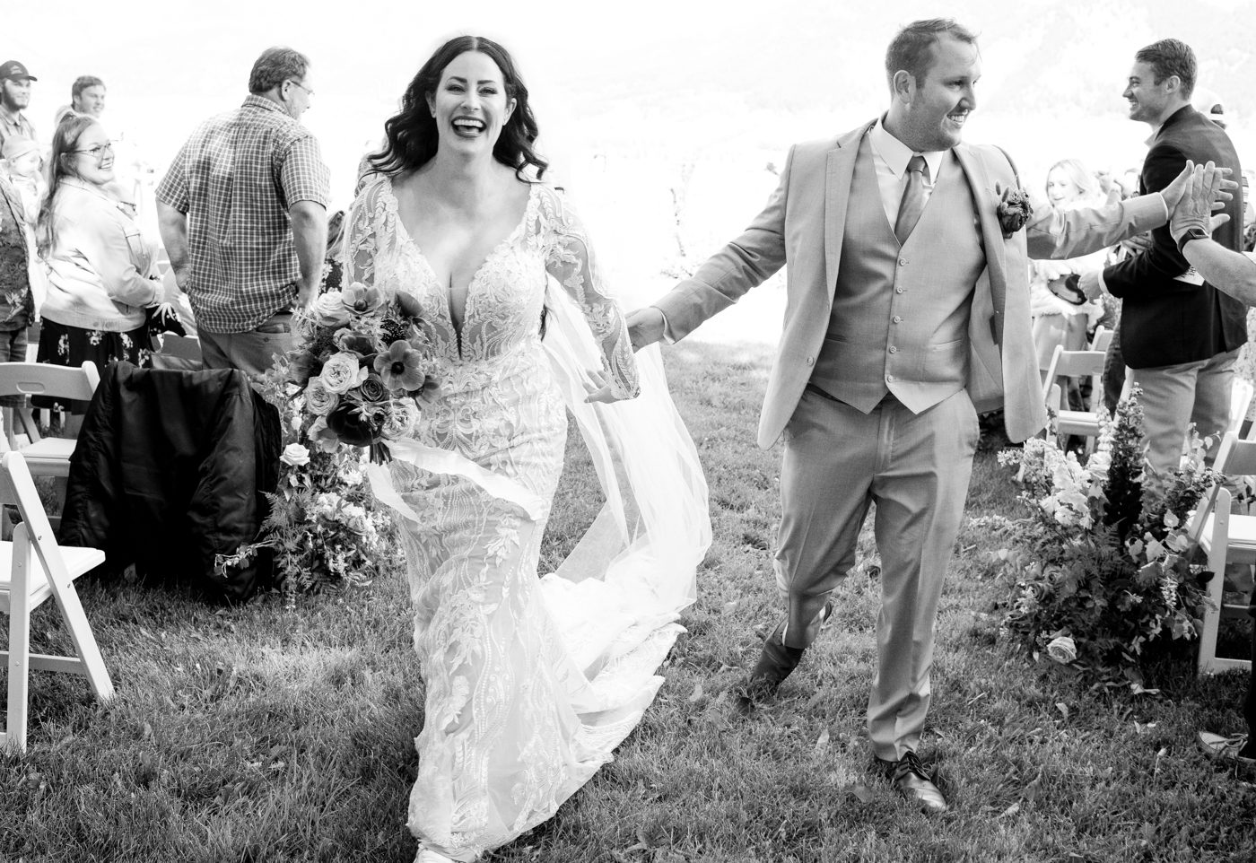Newlyweds-congratulated-walking-down-aisle
