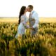 Newlyweds-kiss-in-wheat-field