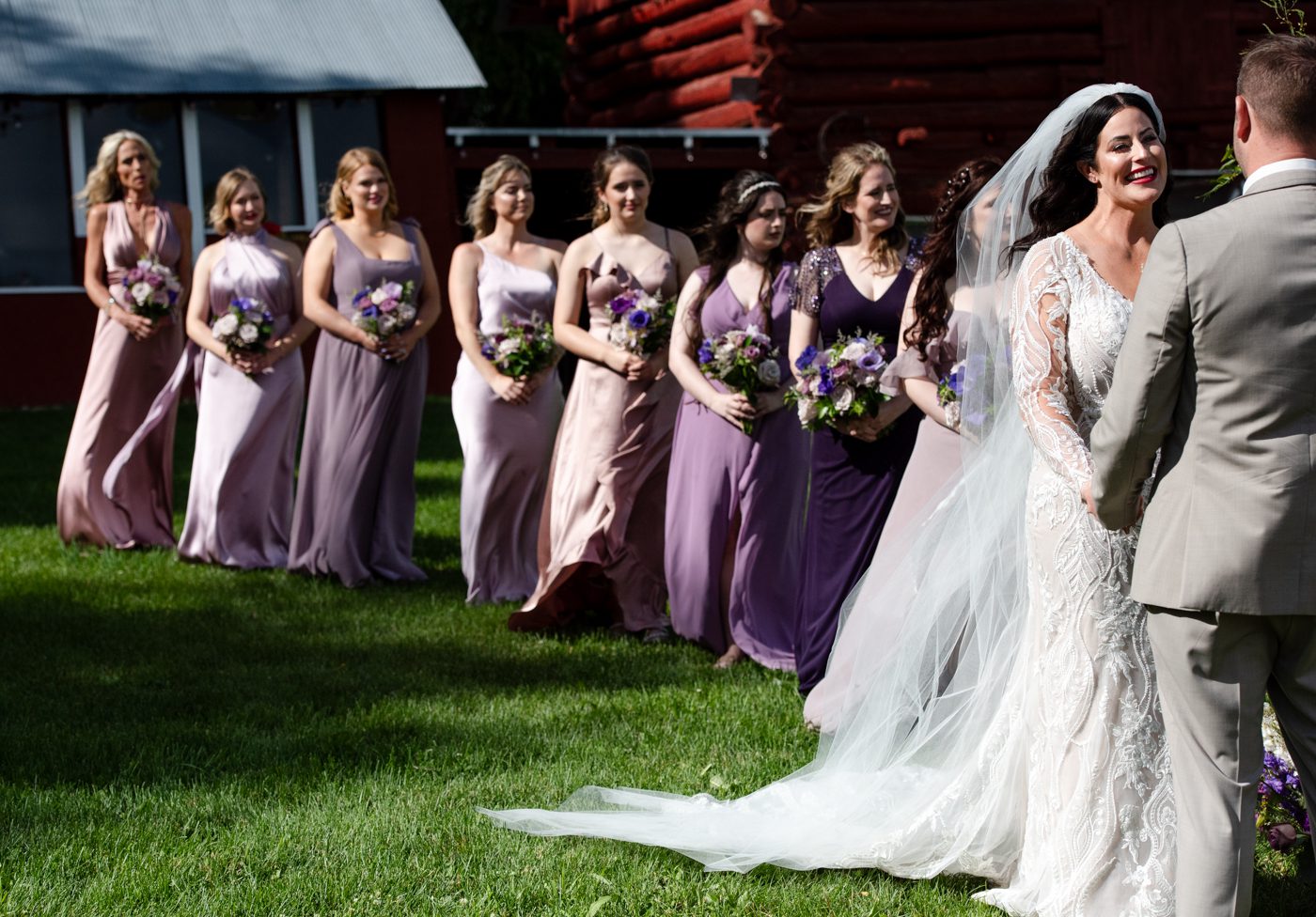 smiling-bride-with-bridesmaids-during-roys-barn-ceremony