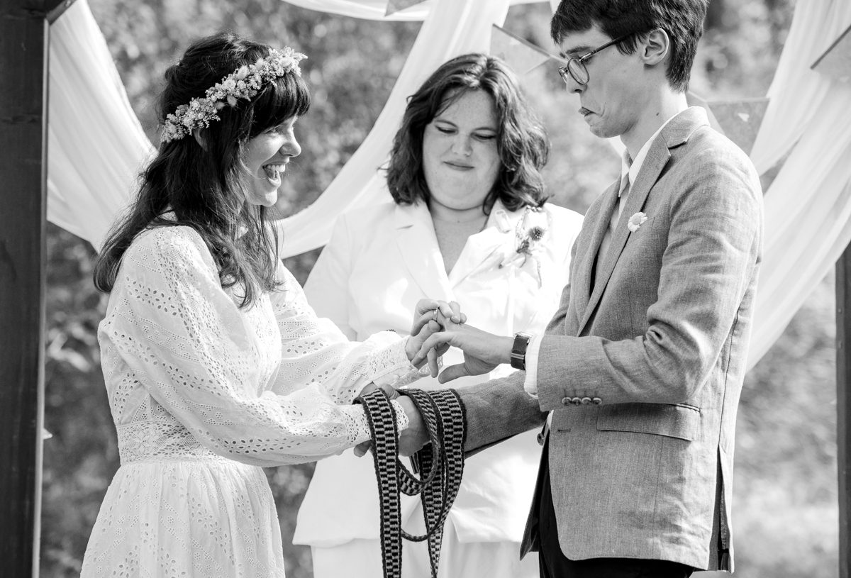 wedding-ring-exchange-at-Gallatin-River-Hideaway-wedding