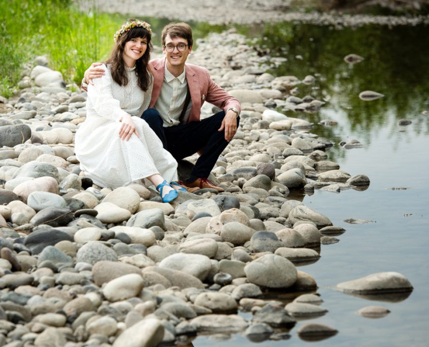 newlyweds-on-the-banks-of-gallatin-river-at-Gallatin-River-Hideaway